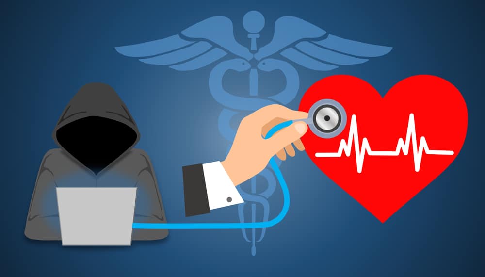 A hacker’s laptop connects to a stethoscope to represent medical devices cybersecurity risk