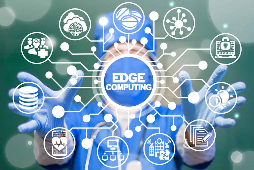 A healthcare worker presents various edge computing concepts to highlight some of the applications of edge computing A healthcare worker presents various edge computing concepts to highlight some of the applications of edge computing