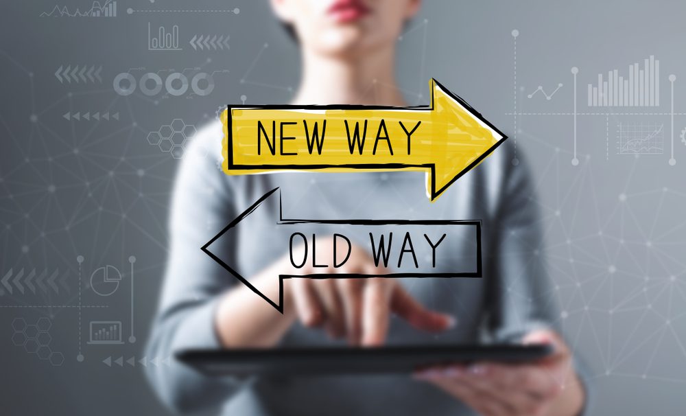 Old,Way,Or,New,Way,With,Business,Woman,Using,A